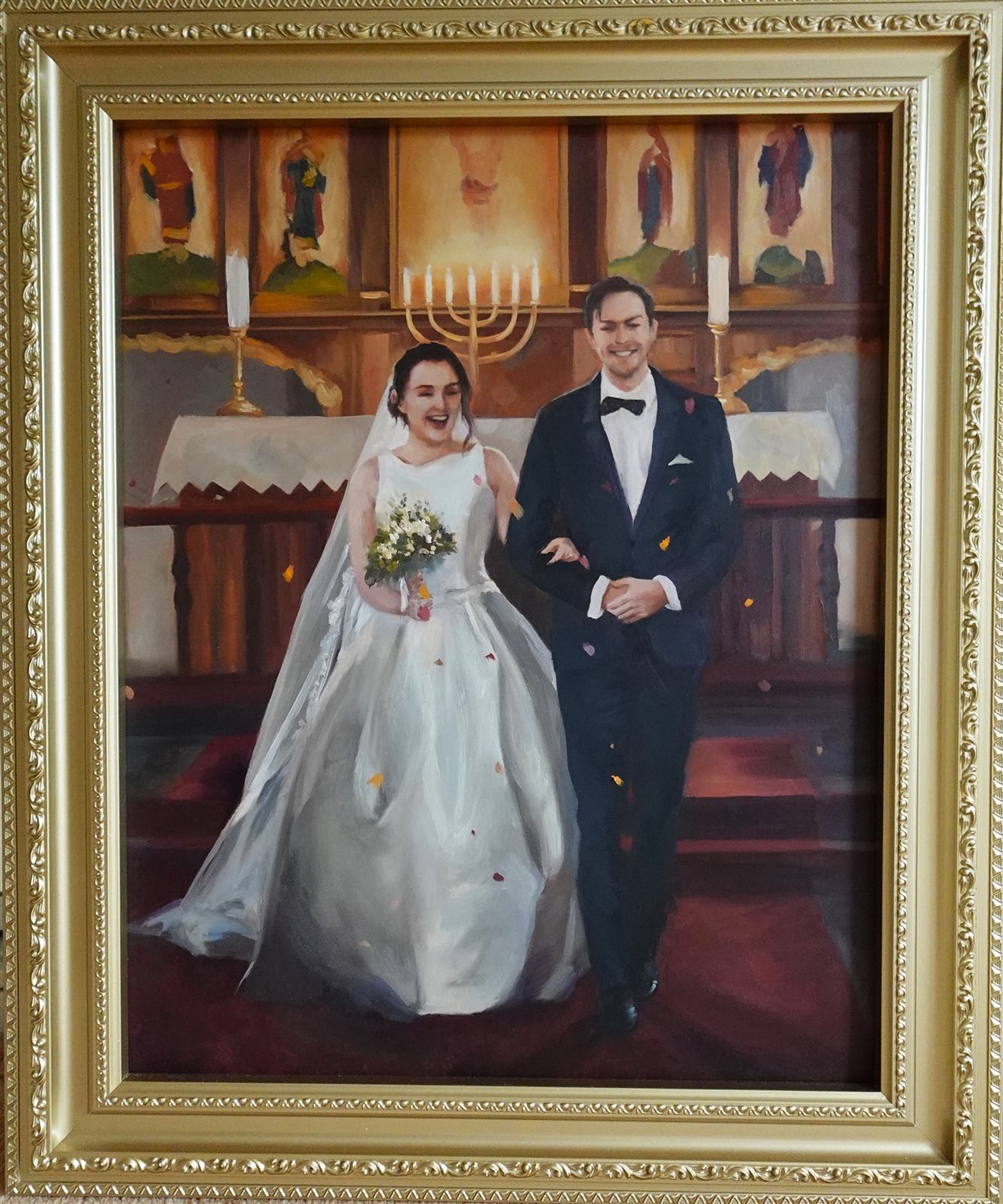 Gold-framed wedding oil painting of a couple walking down the aisle